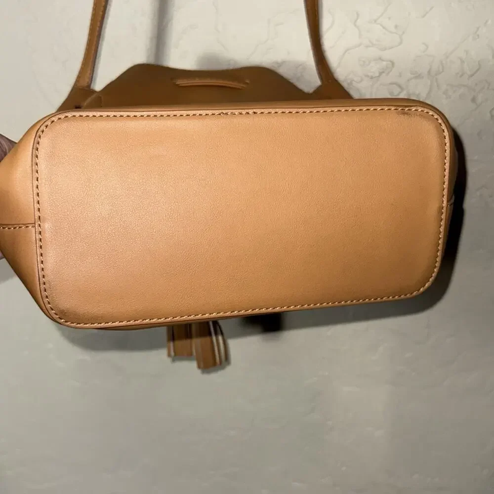 J. Crew drawstring bucket bag vegan leather in camel brown.